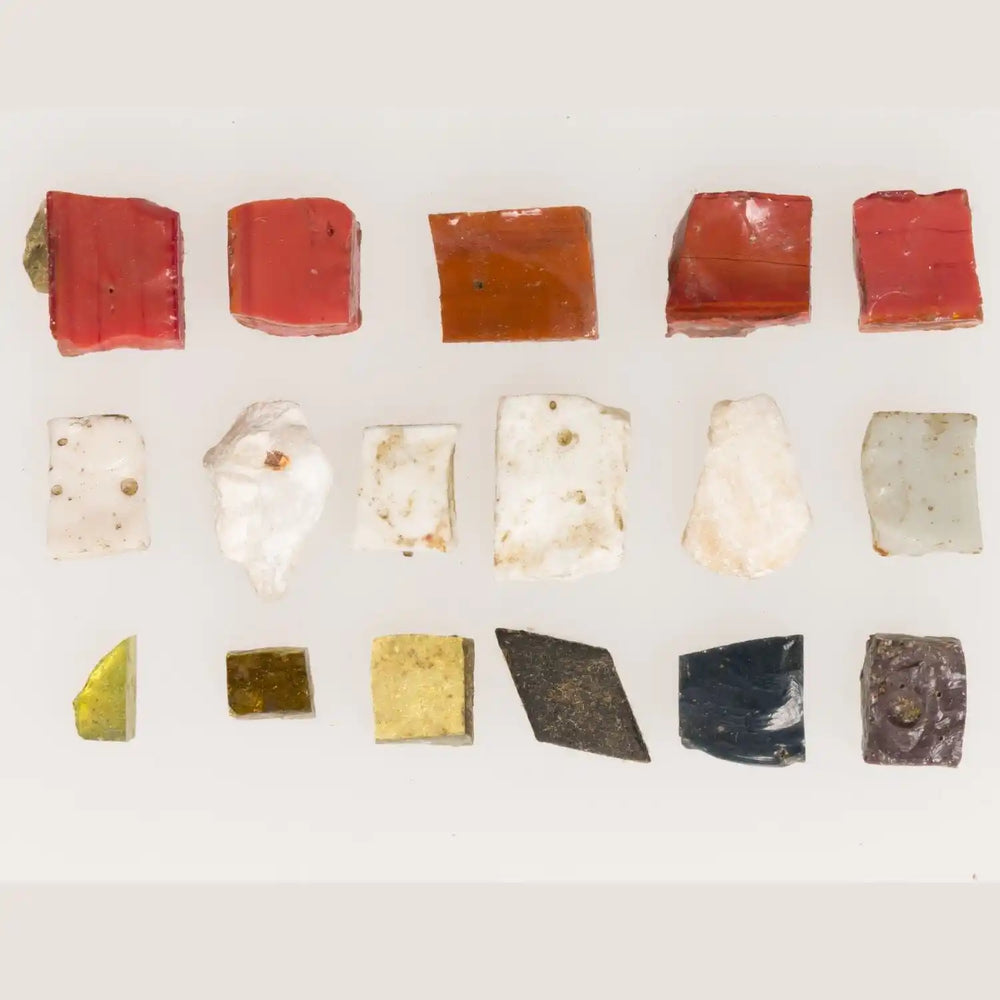 Colorful glass tesserae arranged in a geometric mosaic art pattern for Turkish lamp making