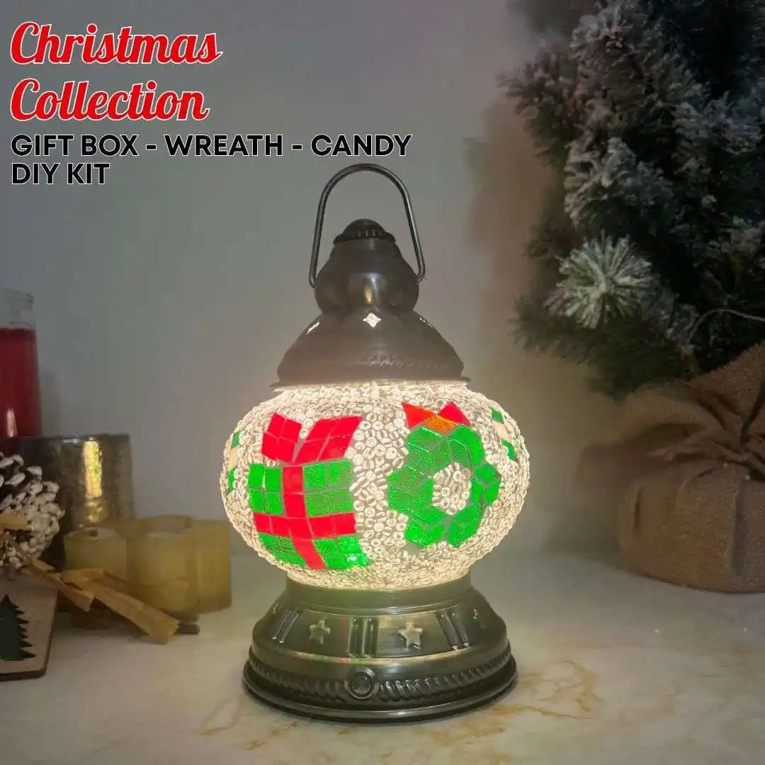 Decorative Christmas lamp with gift box, wreath and candy cane motifs in festive red and green colors