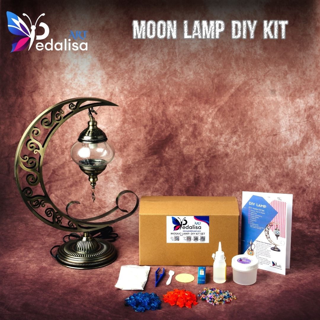 Moon lamp DIY kit with decorative frame and materials on a wooden surface