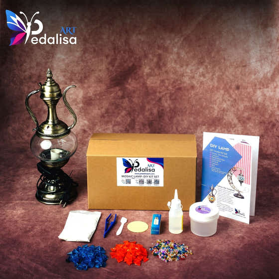 Decorative lamp kit with materials and tools on a brown background, featuring Pedalisa branding.