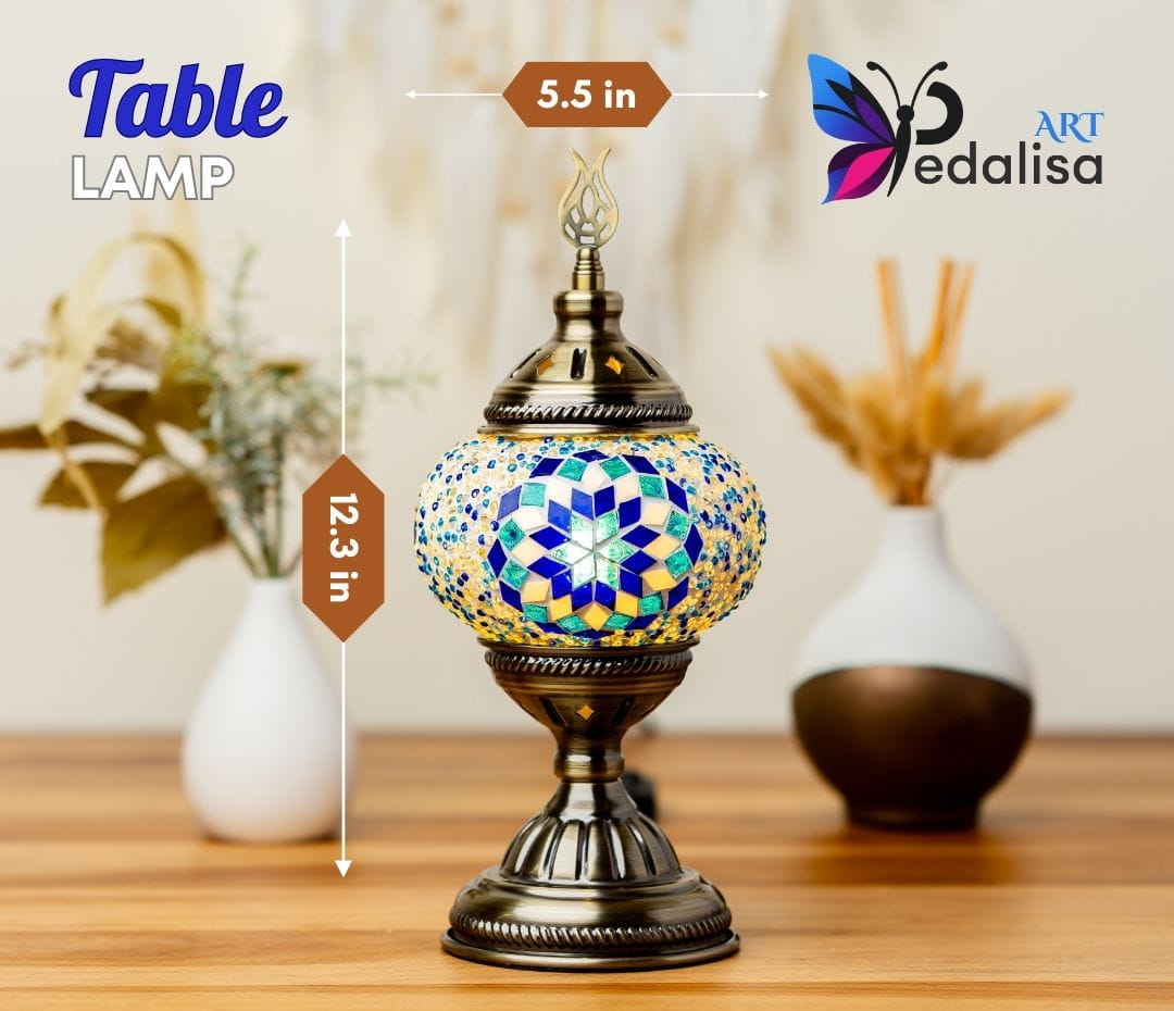 Decorative table lamp with mosaic design on a wooden surface