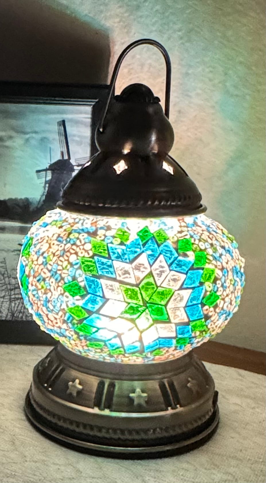 Mosaic rechargeable lamp with colorful design on a table