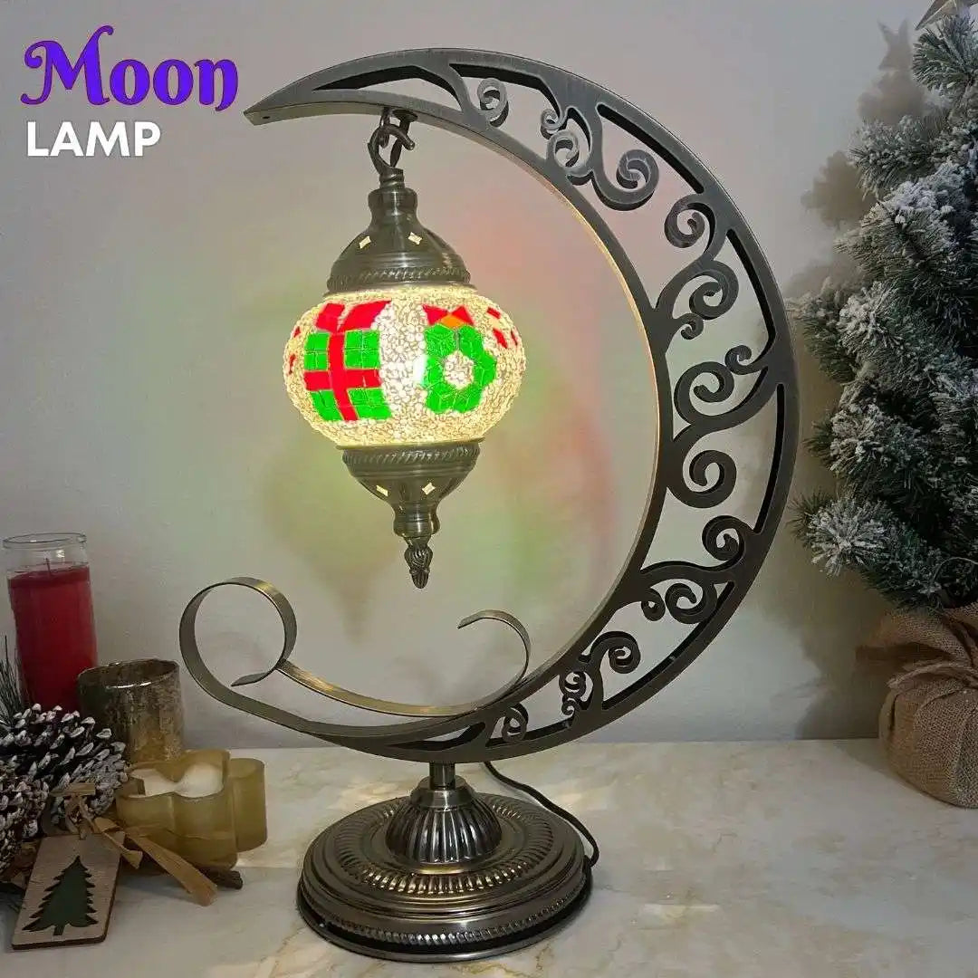 Decorative moon-shaped lamp with festive Christmas HO design and wreath candy motif