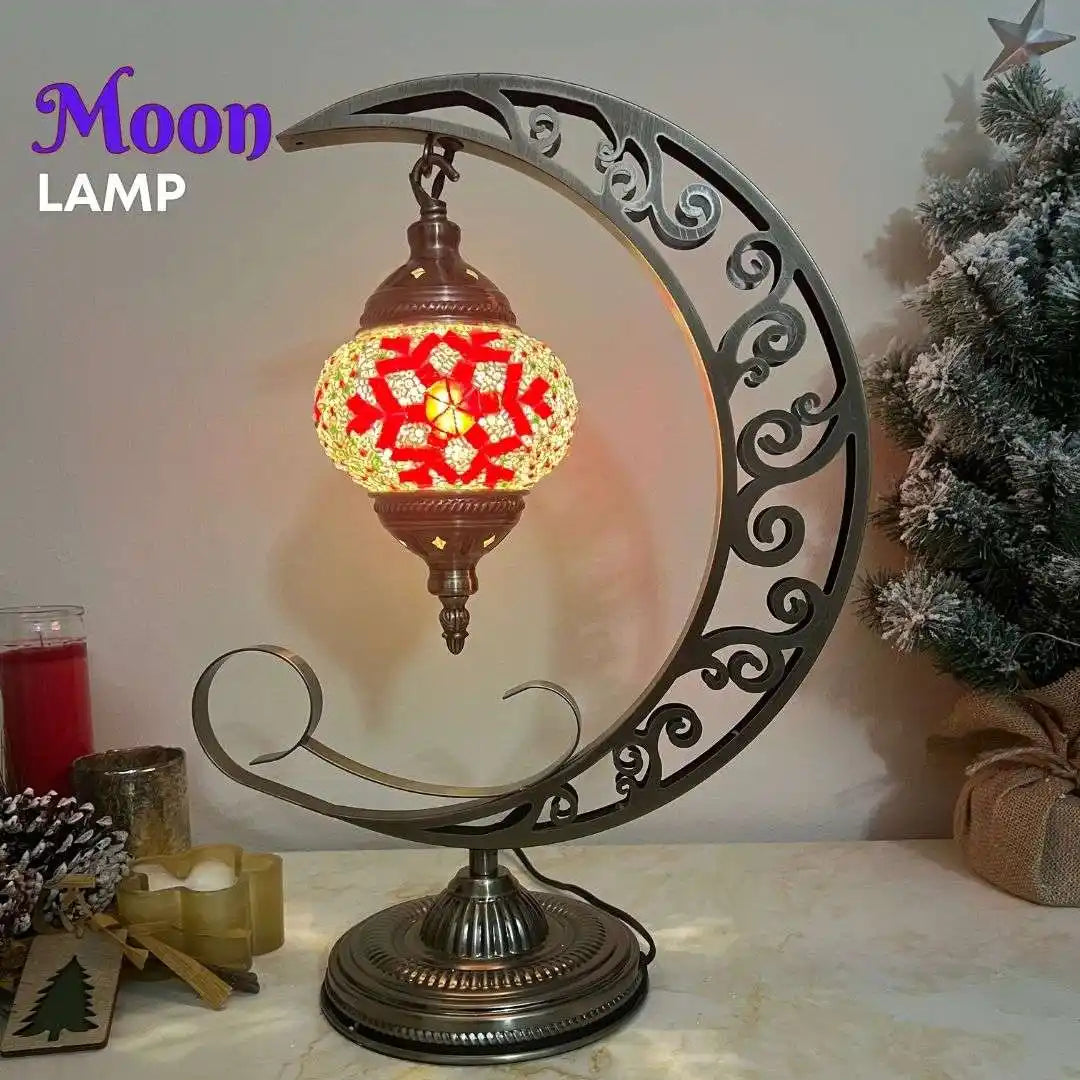 Decorative moon-shaped lamp stand with red snowflake pattern mosaic glass shade