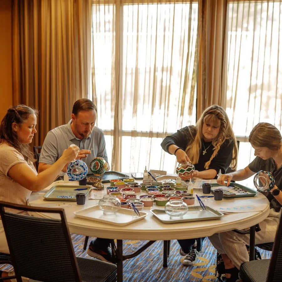 Guests creating handmade Turkish mosaic lamps at Pedalisa Art near Dallas