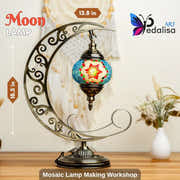 Decorative moon shaped lamp with mosaic design on a wooden surface, featuring Pedalisa branding.