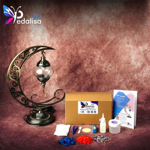 Decorative moon lamp kit with materials and Pedalisa branding on a brown background