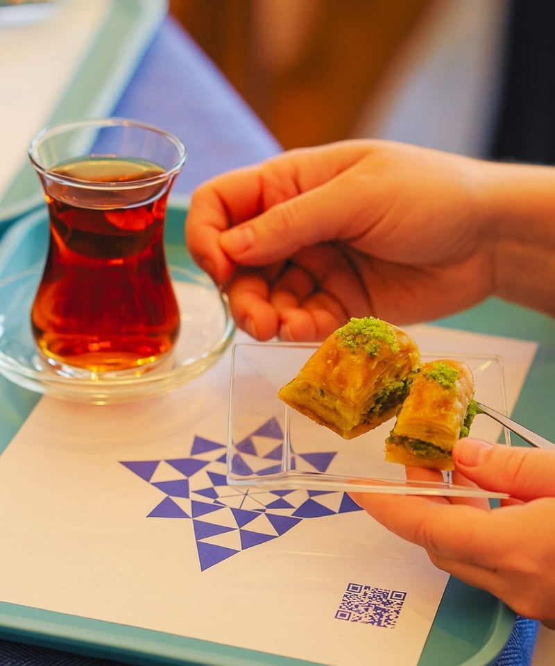 Turkish tea, handmade baklava, and Turkish delight served during a Pedalisa Art mosaic lamp workshop near League City
